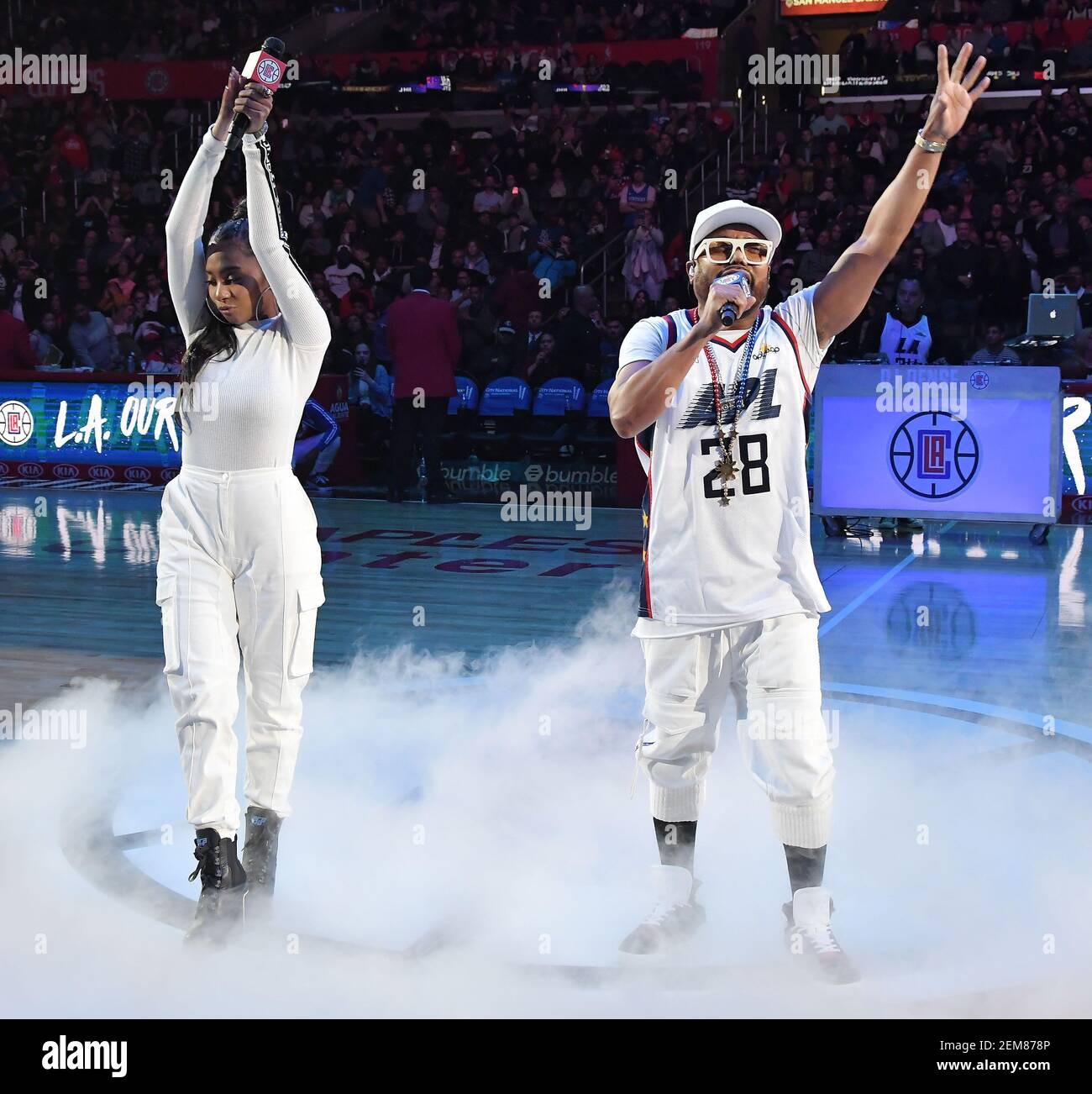 (LR) Jessica Reynoso and Apl.De.Ap of the Black Eyed Peas performing