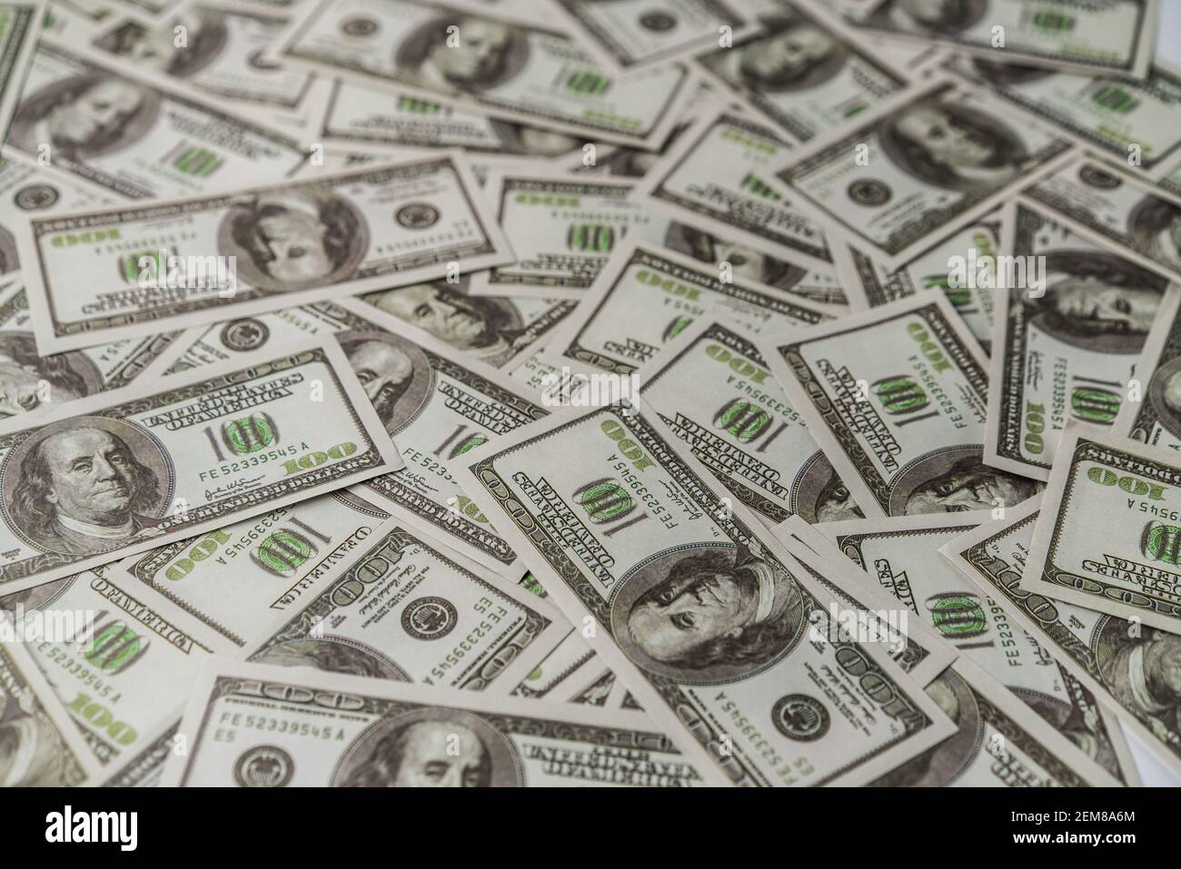 Large money number of many American one hundred dollar paper banknote . Concept of money finance