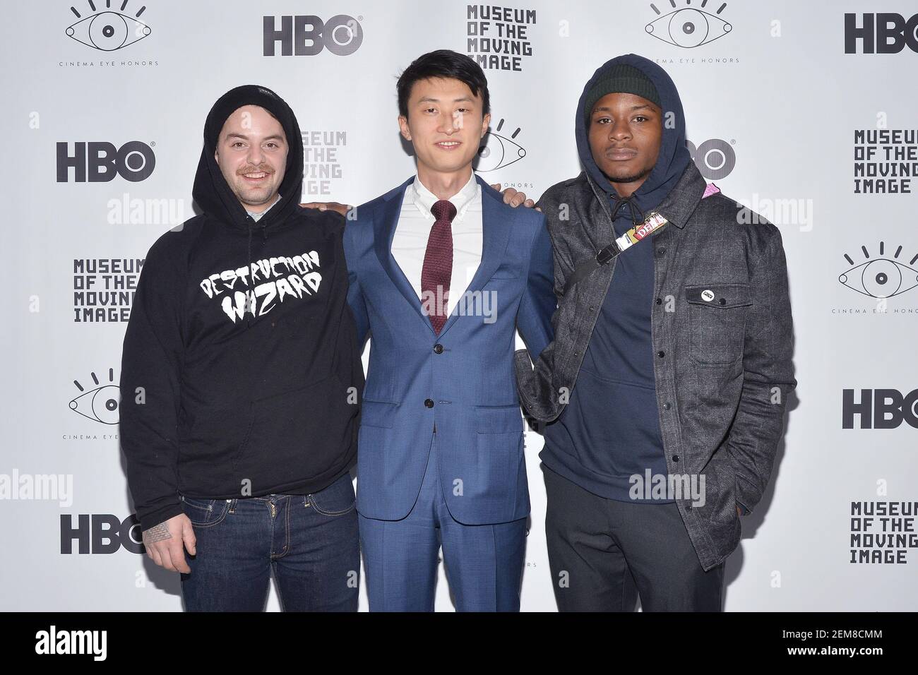 L-R) Zack Mulligan, Director Bing Liu and Keire Johnson for "Minding The Gap"  attend The 12th Annual Cinema Eye Honors Awards at the Museum of Moving  Images in the New York City