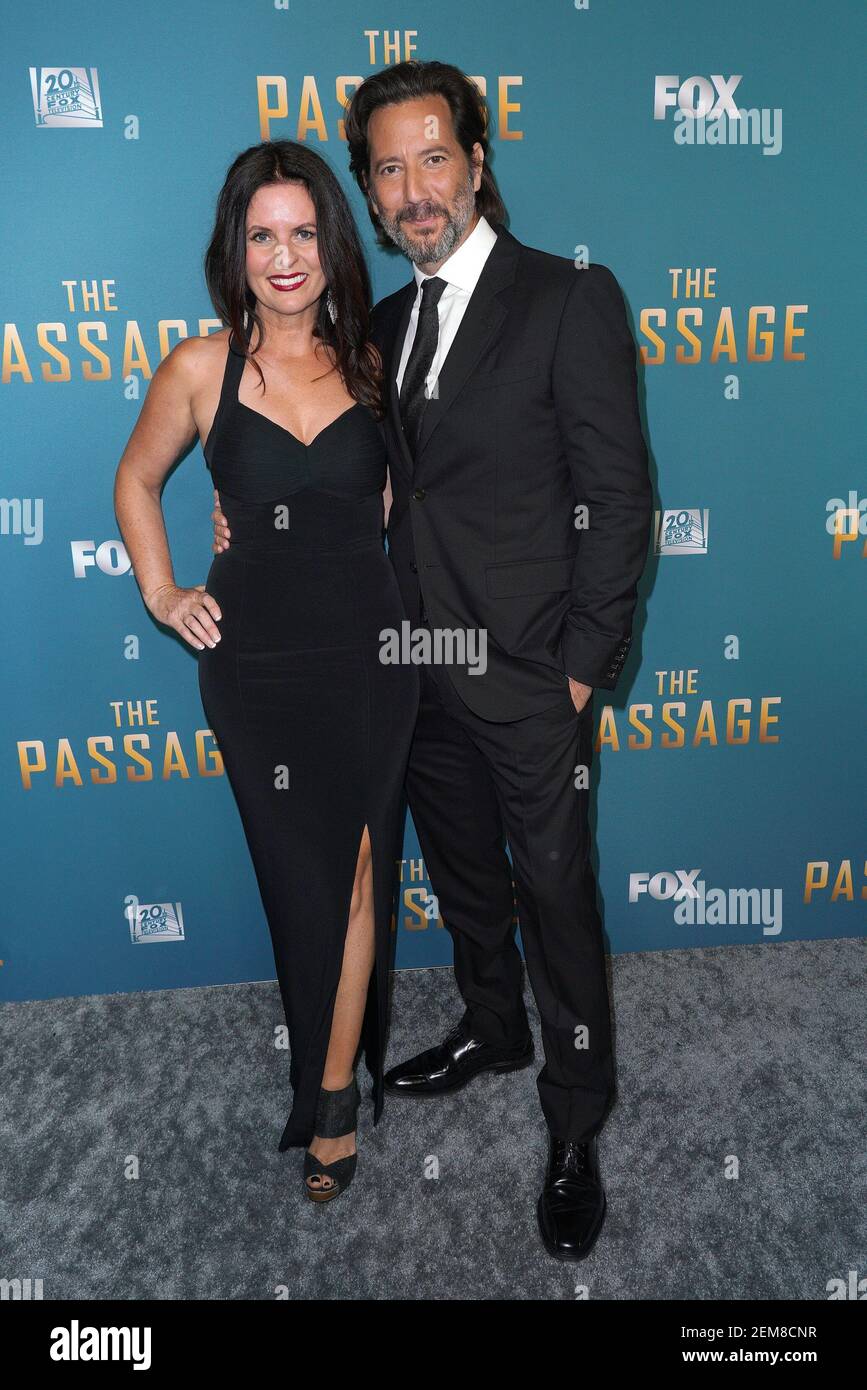 Henry Ian Cusick (R) and Annie Cusick Wood at the FOX's 'The Passage' Los Angeles Premiere held
