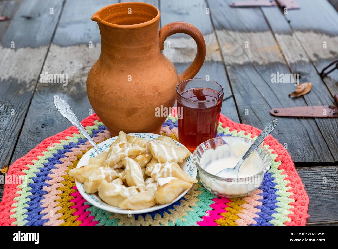 Close view of traditional cossacs meal perogies served with whig and uzvar Stock Photo