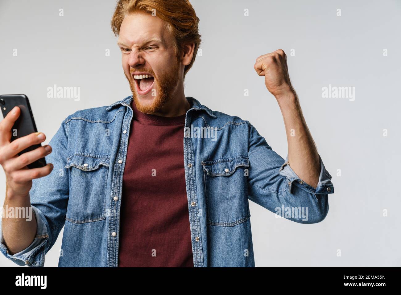 Happy excited redhead man hi-res stock photography and images - Alamy