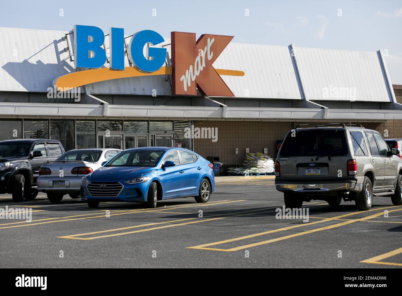 A logo sign outside of a Big Kmart retail store location in