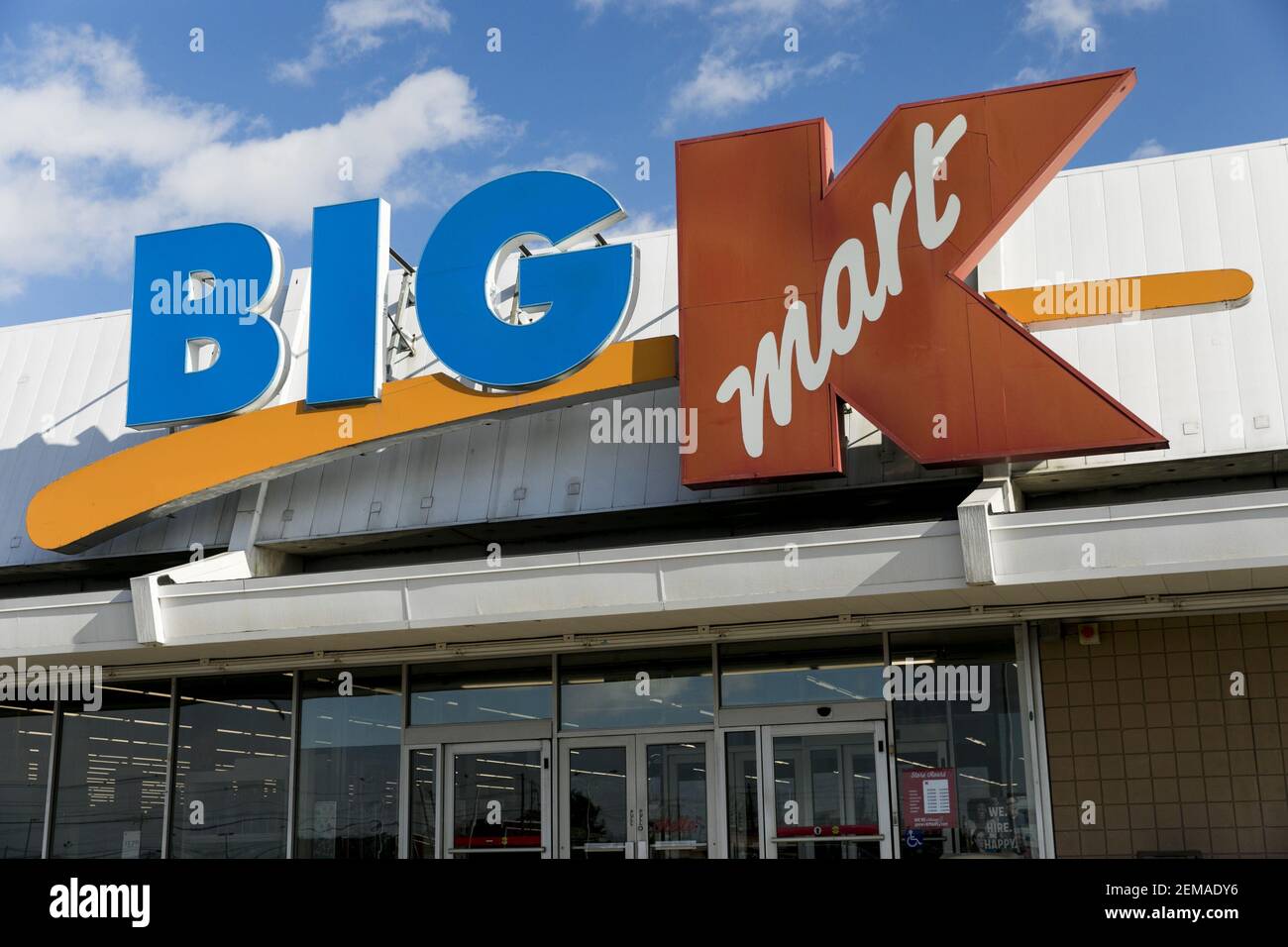 A logo sign outside of a Big Kmart retail store location in