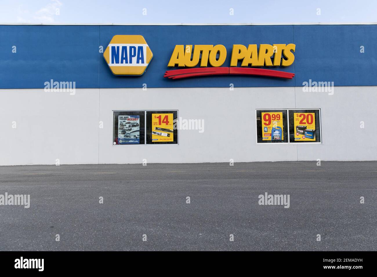 A logo sign outside of a NAPA Auto Parts retail store location in