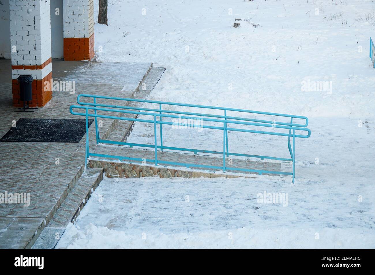 View on Ramp for the disabled at the entrance in the winter time Stock ...