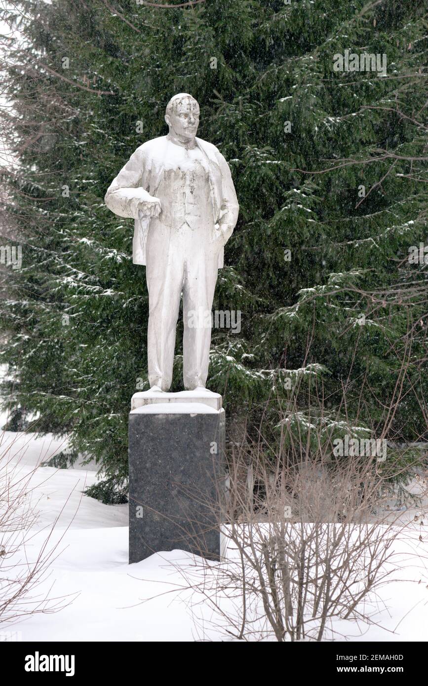 Lenin granite monument in the winter park snowfall Stock Photo