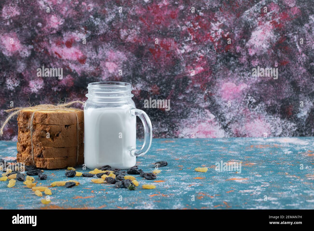 Tied pie slices with a jar of milk aside Stock Photo - Alamy