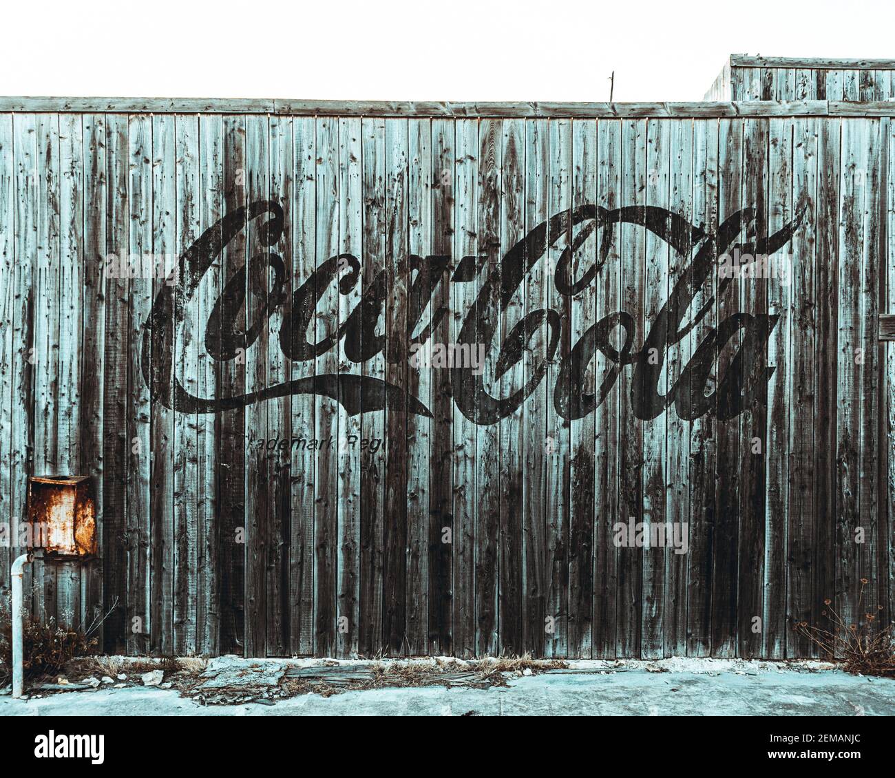 Coca Cola Vintage wall in abandoned cinema studio Stock Photo