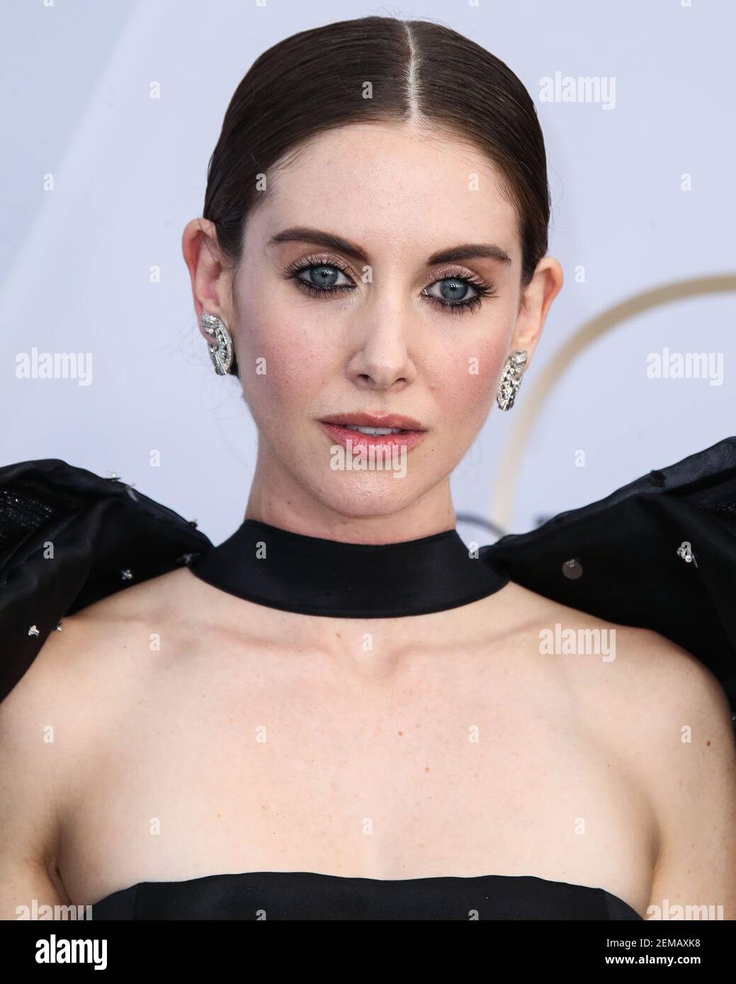 LOS ANGELES, CA, USA JANUARY 27 Actress Alison Brie wearing a Miu