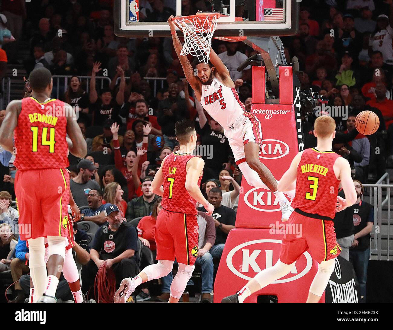Miami Heat forward Derrick Jones Jr. slams for two over Atlanta Hawks defenders Jeremy Lin and Kevin Huerter during the first half on Sunday, Jan. 6, 2019 at State Farm Arena in Atlanta, Ga. (Photo by Curtis Compton/Atlanta Journal-Constitution/TNS/Sipa USA) Stock Photo