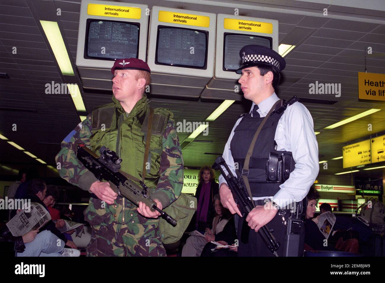 File photo dated 18/01/91 of a soldier and an armed police officer patrolling Gatwick Airport following heightened security at home after the outbreak of the Gulf war. Issue date: Thursday February 25, 2021. Margaret Thatcher was urged by a government colleague not to embark on a smear campaign against Saddam Hussein at the start of the Gulf War amid concerns over Britain's arms dealings with the Iraqi regime, previously classified papers reveal. Foreign Office minister William Waldegrave said 'propaganda' against Saddam, requested by the then prime minister, was 'not difficult to come by', bu Stock Photo