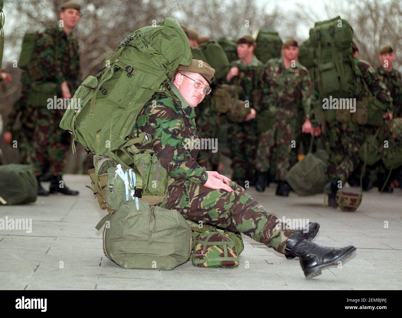 File photo dated 23/01/91 of Guardsman Sean Richard Bower from Hull, of the Coldstream Guards, whose duties will include guarding prisoners of war in the Gulf conflict, waits with his comrades for departure to the Gulf. Issue date: Thursday February 25, 2021. Margaret Thatcher was urged by a government colleague not to embark on a smear campaign against Saddam Hussein at the start of the Gulf War amid concerns over Britain's arms dealings with the Iraqi regime, previously classified papers reveal. Foreign Office minister William Waldegrave said 'propaganda' against Saddam, requested by the the Stock Photo