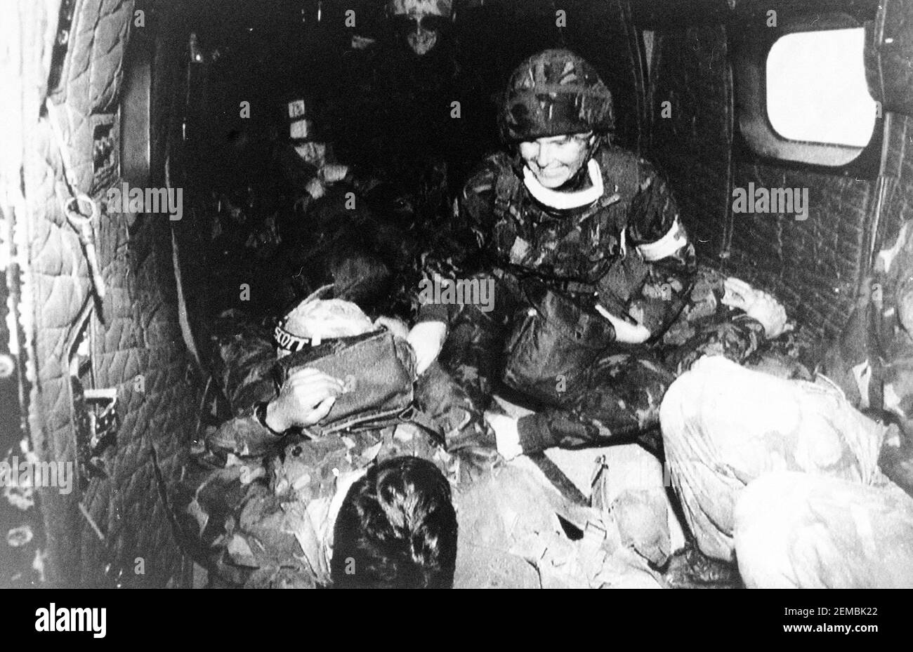 BLACK AND WHITE ONLY File photo dated 12/02/91 of nurse Jenny Campbell, 26, from Hull, tending troops during a casualty evacuation exercise in the Gulf to take battle-wounded soldiers from the front by helicopter, during the 1991 Gulf war. Issue date: Thursday February 25, 2021. Margaret Thatcher was urged by a government colleague not to embark on a smear campaign against Saddam Hussein at the start of the Gulf War amid concerns over Britain's arms dealings with the Iraqi regime, previously classified papers reveal. Foreign Office minister William Waldegrave said 'propaganda' against Saddam,  Stock Photo