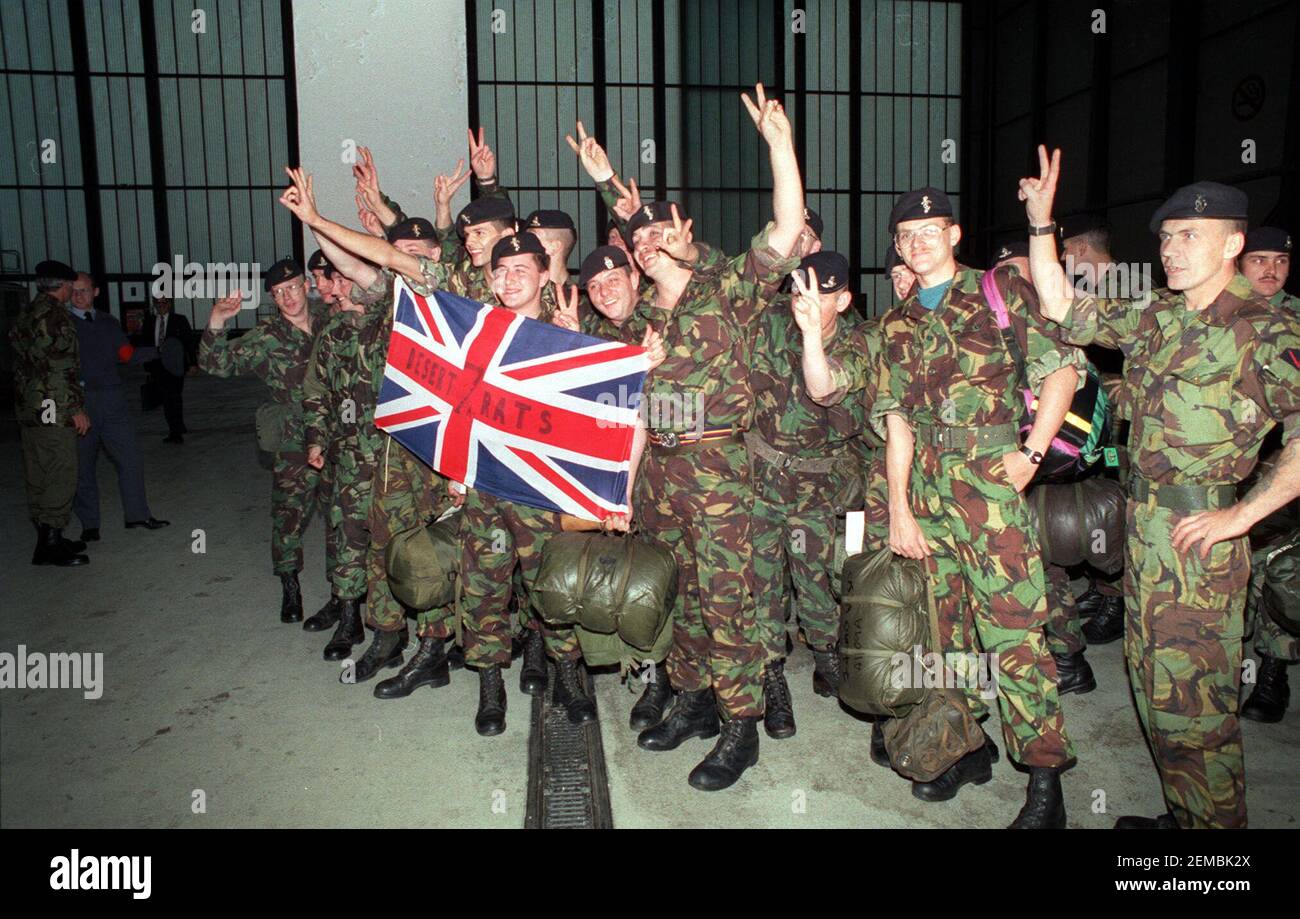 File photo dated 17/10/90 of Desert Rat Signallers with a Union flag in Hamburg before flying to Saudi Arabia, during the 1991 Gulf war. Issue date: Thursday February 25, 2021. Margaret Thatcher was urged by a government colleague not to embark on a smear campaign against Saddam Hussein at the start of the Gulf War amid concerns over Britain's arms dealings with the Iraqi regime, previously classified papers reveal. Foreign Office minister William Waldegrave said 'propaganda' against Saddam, requested by the then prime minister, was 'not difficult to come by', but he warned such a tactic would Stock Photo