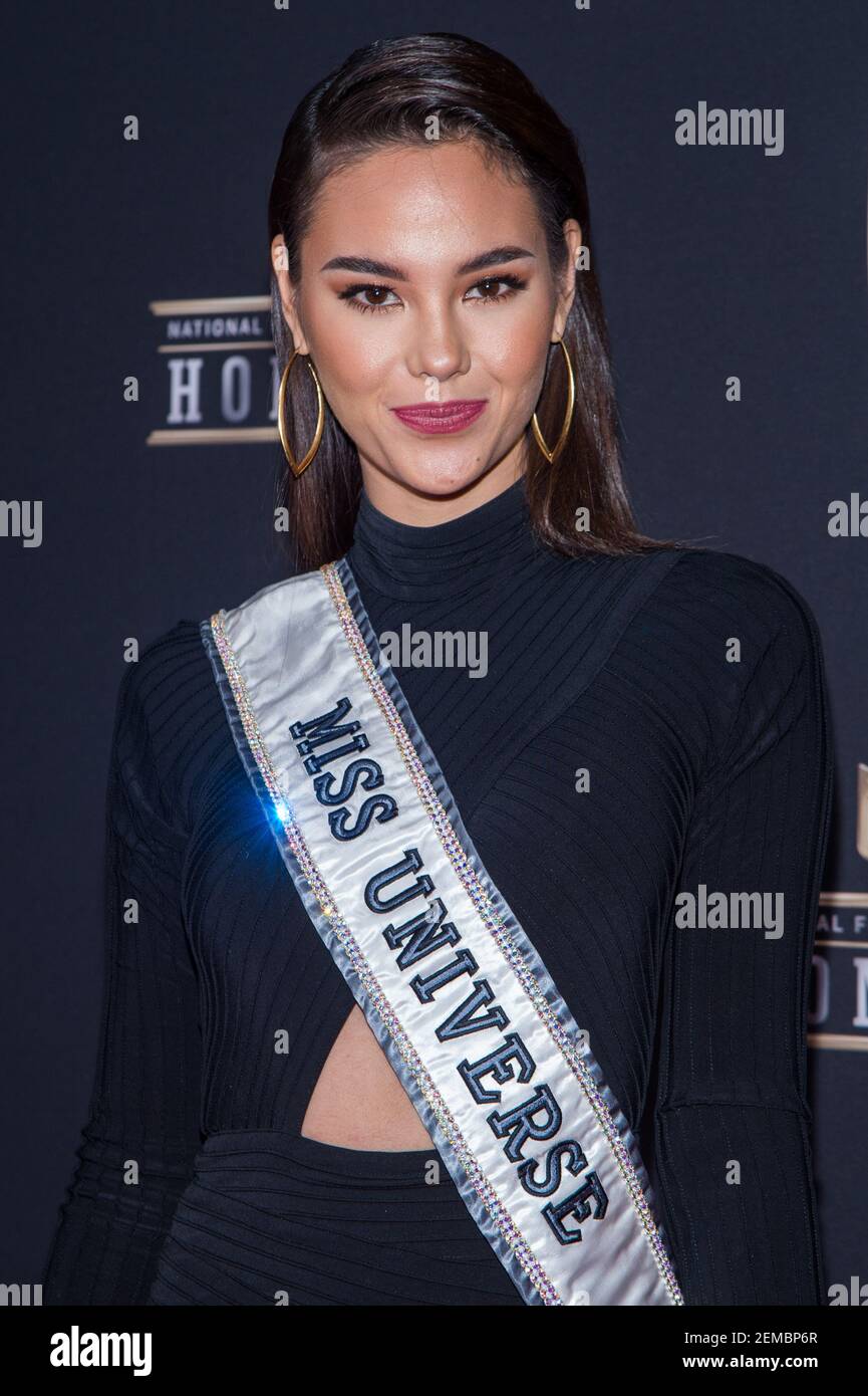 Miss Universe Catriona Gray walking the red carpet at the NFL Honors