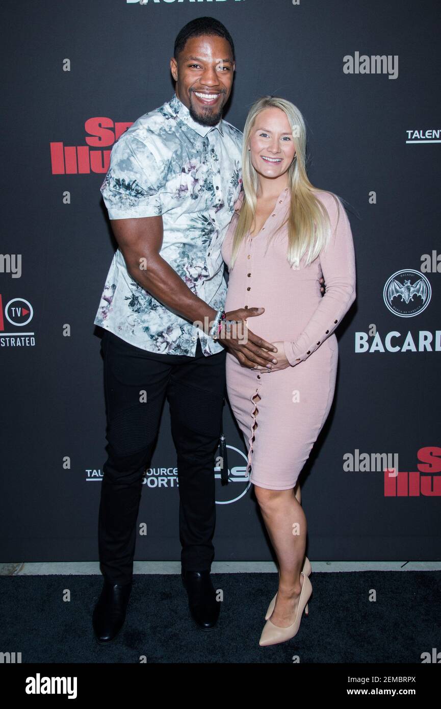 David Johnson and Meghan Brock walking the red Carpet at Sports Illustrated  Super Bowl Party held at Chick-fil-A College Football Hall of Fame in  Atlanta, Georgia on Feb. 2, 2019. (Photo by