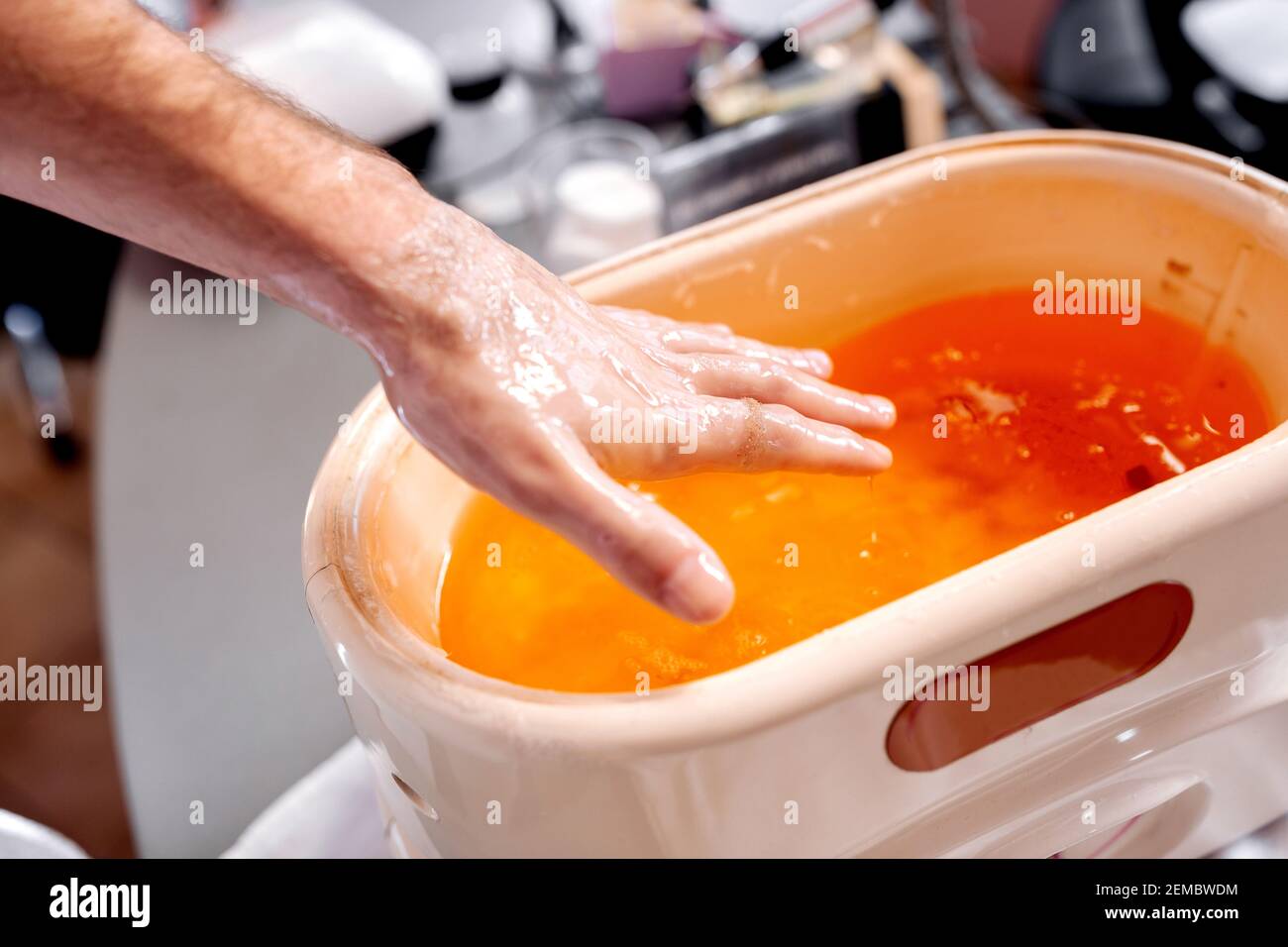 Manicure treatment with applying paraffin wax, nail salon, extra soft