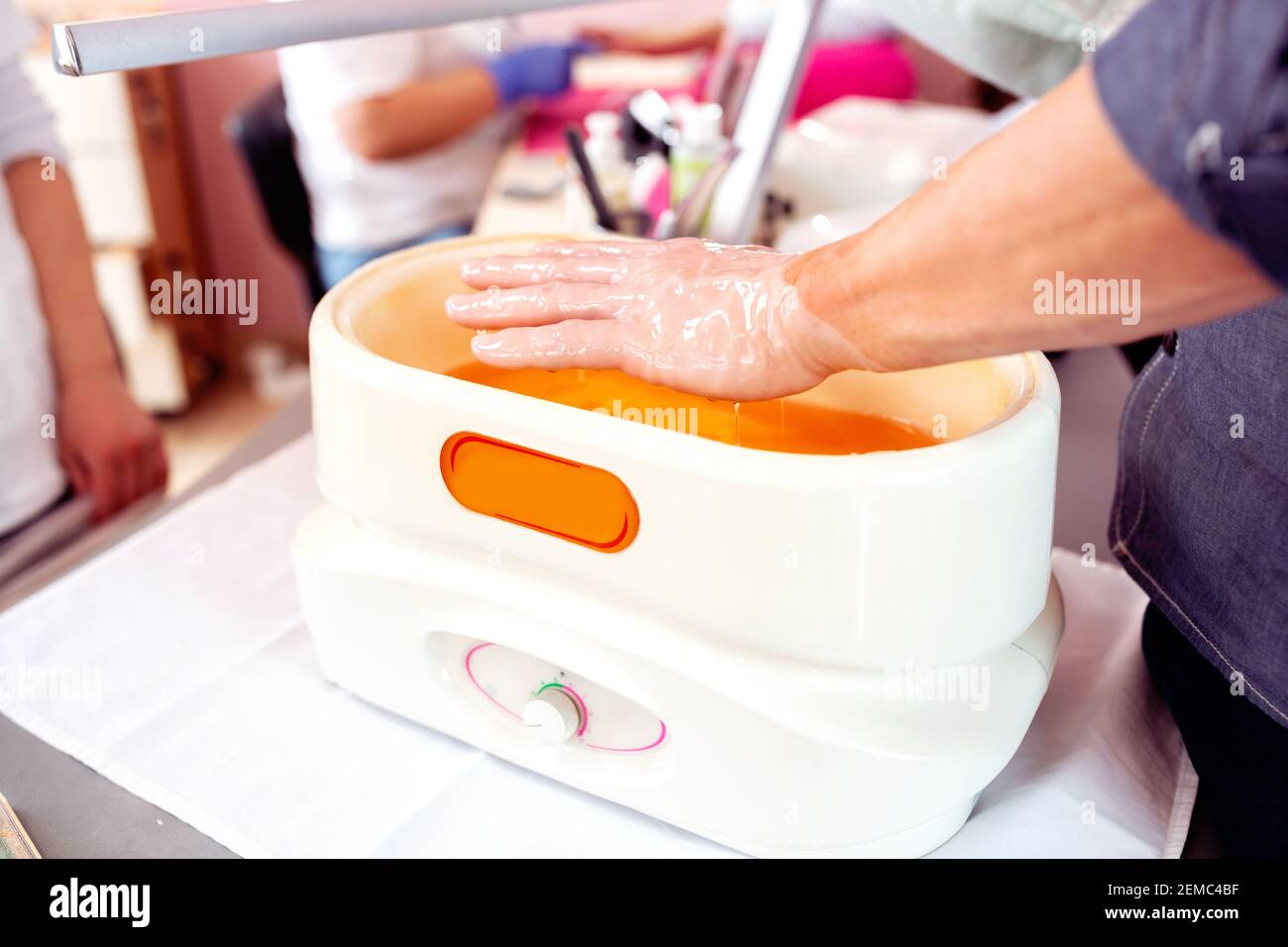 Paraffin wax manicure treatment for soft and smooth skin, manicure salon Stock Photo Alamy