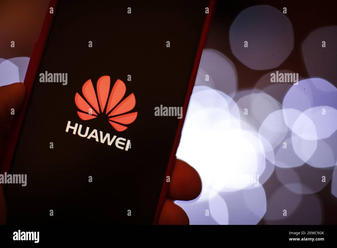 The Huawei logo is seen on a mobile device screen in this photo ...