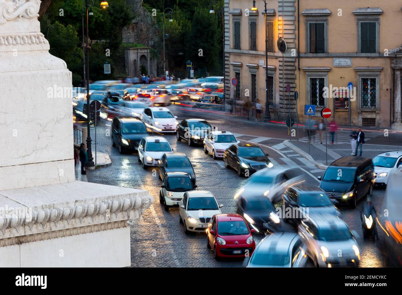 Rome, Italy - Oct 02, 2018: Evening traffic on the Piazza Venezia in Rome, motion blur Stock Photo