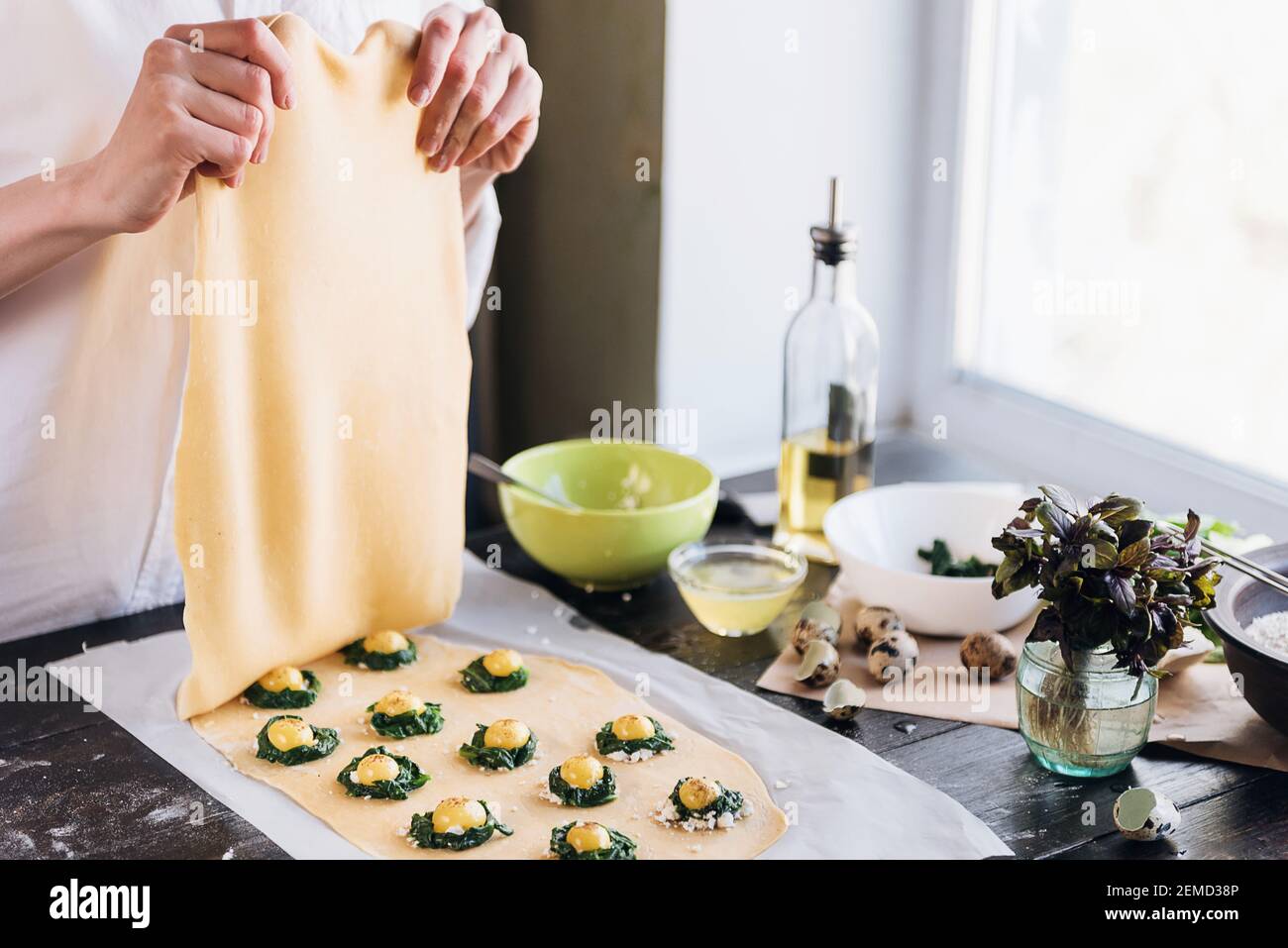 Step by step the chef prepares ravioli with ricotta cheese, yolks quail