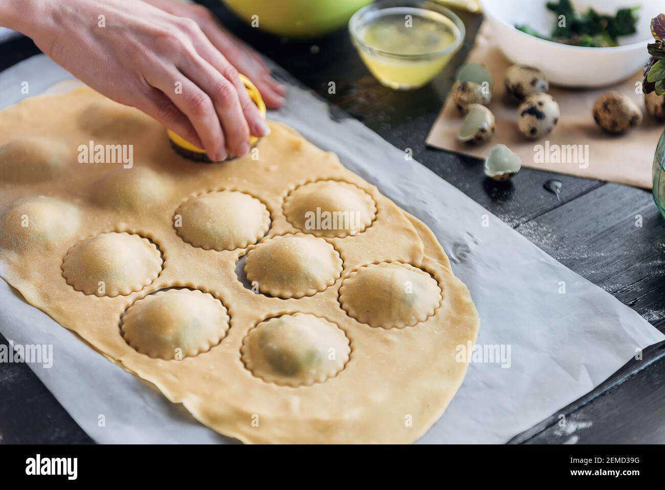 Step by step the chef prepares ravioli with ricotta cheese, yolks quail