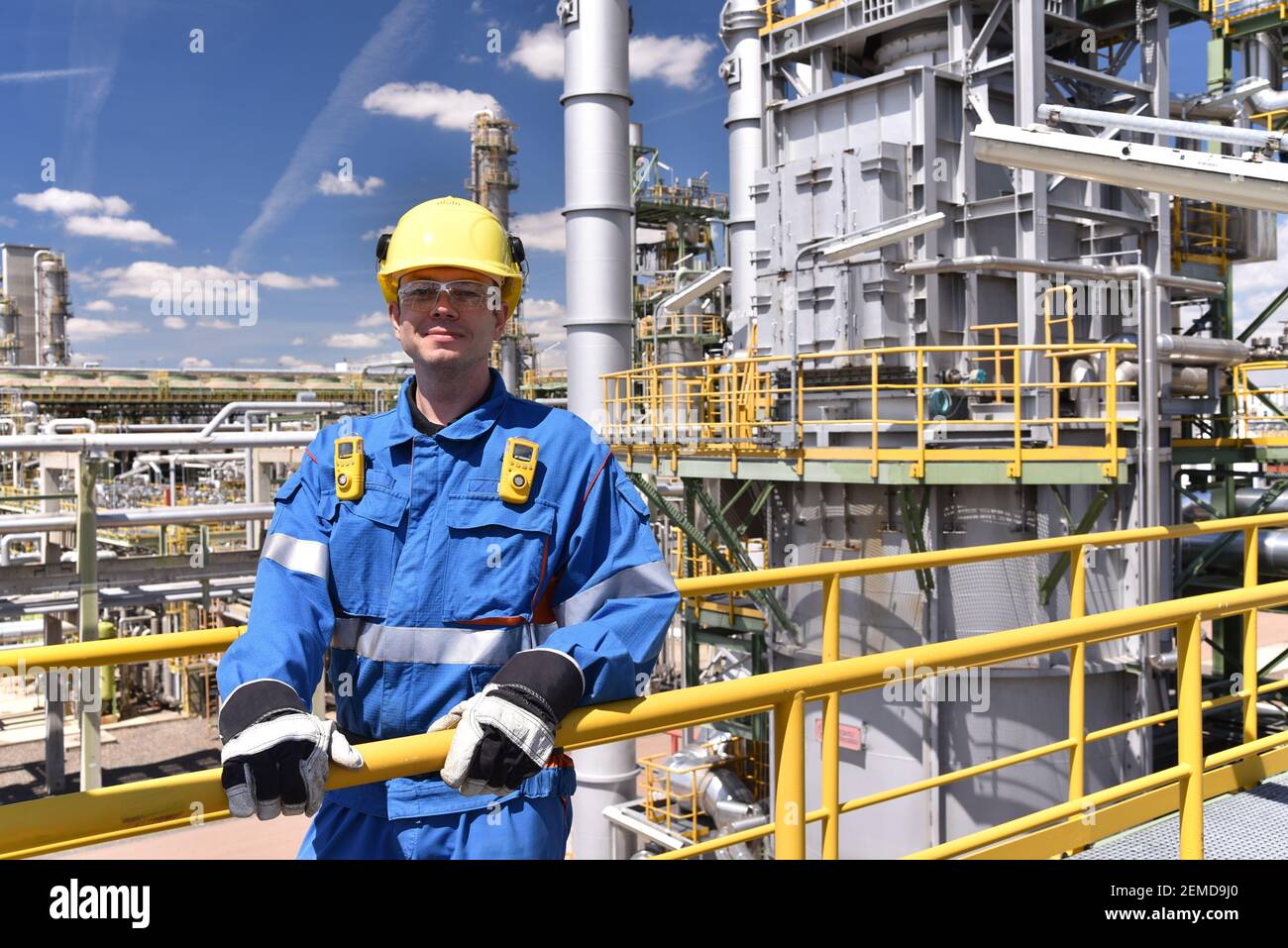 workers in an industrial plant for the production and processing of crude oil Stock Photo