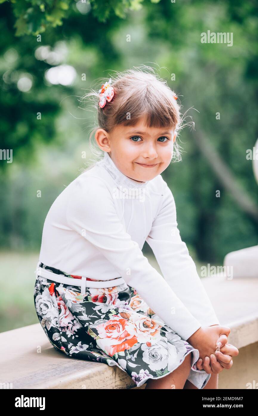 Little girl in the park Stock Photo - Alamy