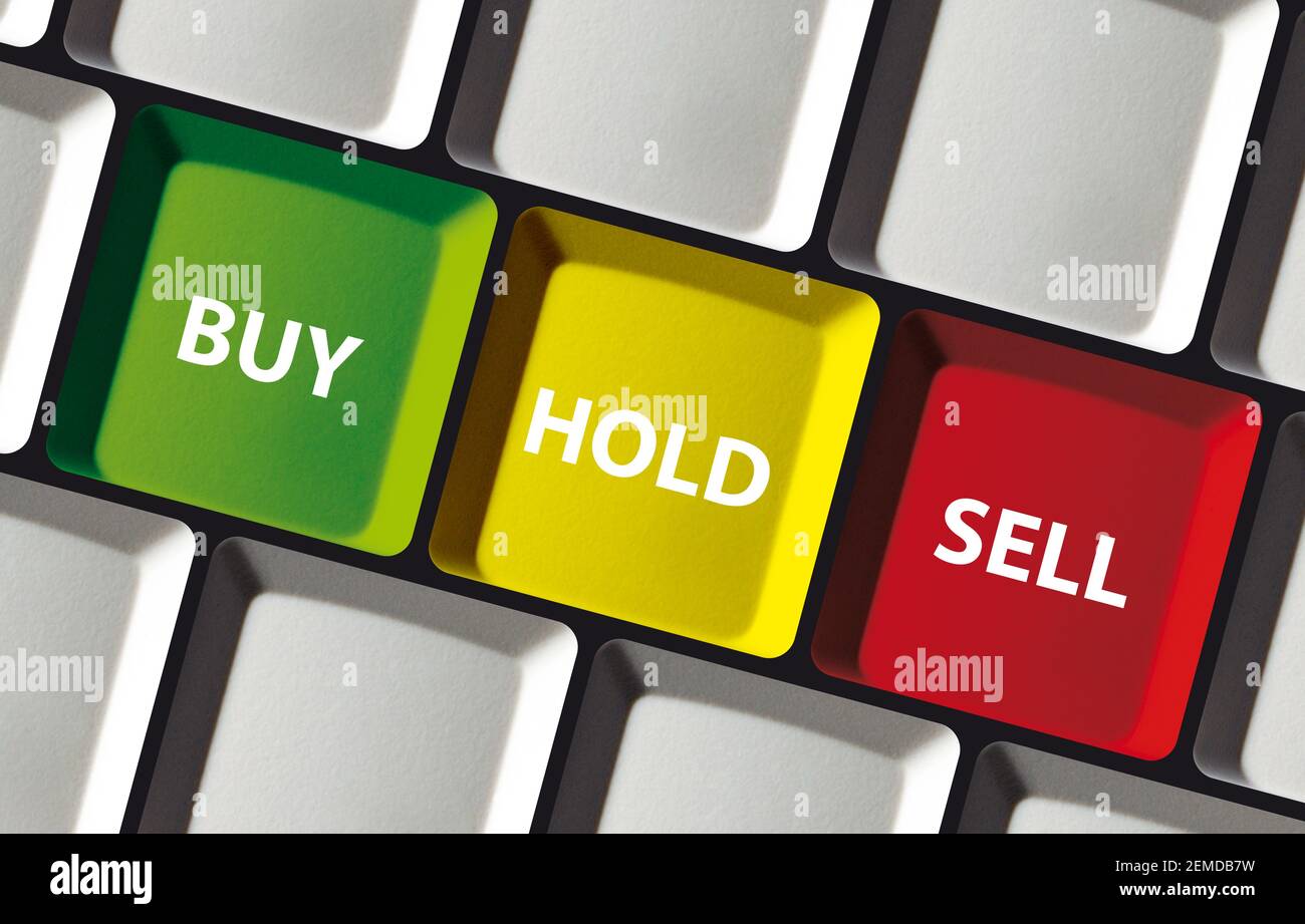 Buy hold sell button on computer keyboard - concept stock exchange invest trade Stock Photo