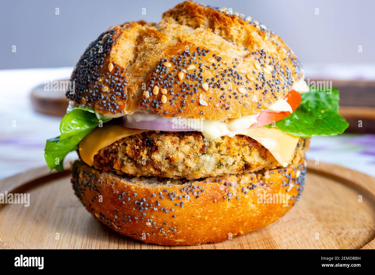 Tasty vegetarian fast or street food, homemade burgers made from orange lentils legumes with