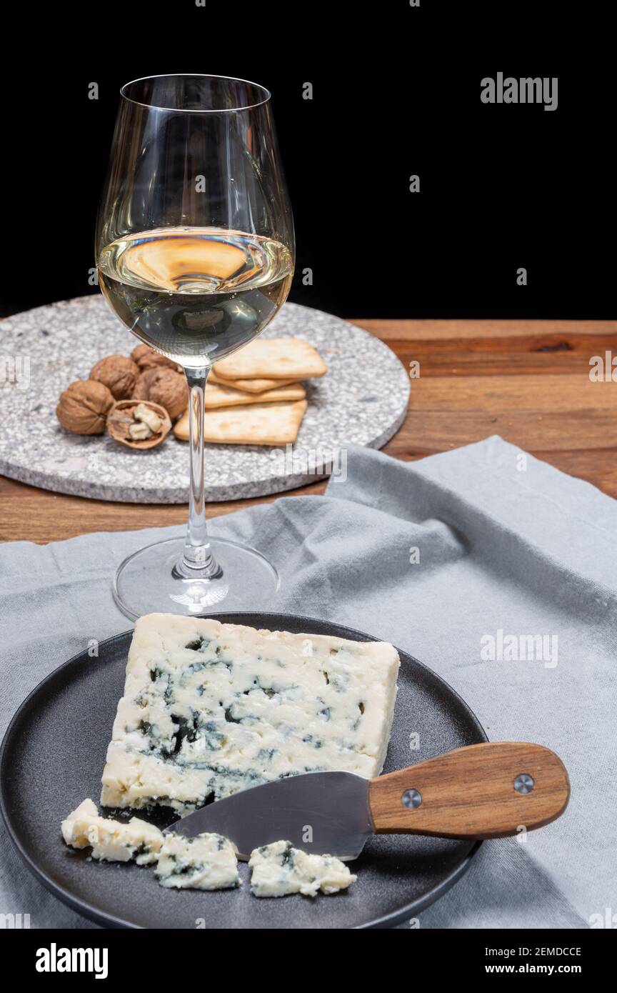 Cheese and wine pairing, french soft blue roquefort cheese and sweet