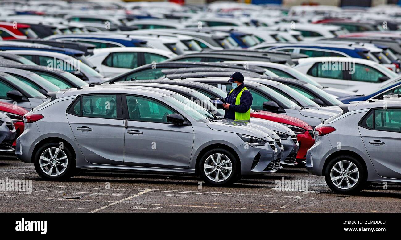 Cars at the Vauxhall plant in Ellesmere Port, Cheshire. Workers at Vauxhall's UK car factory are waiting for news about the future of the plant, with an announcement expected later on Thursday. Picture date: Wednesday February 24, 2021. Stock Photo