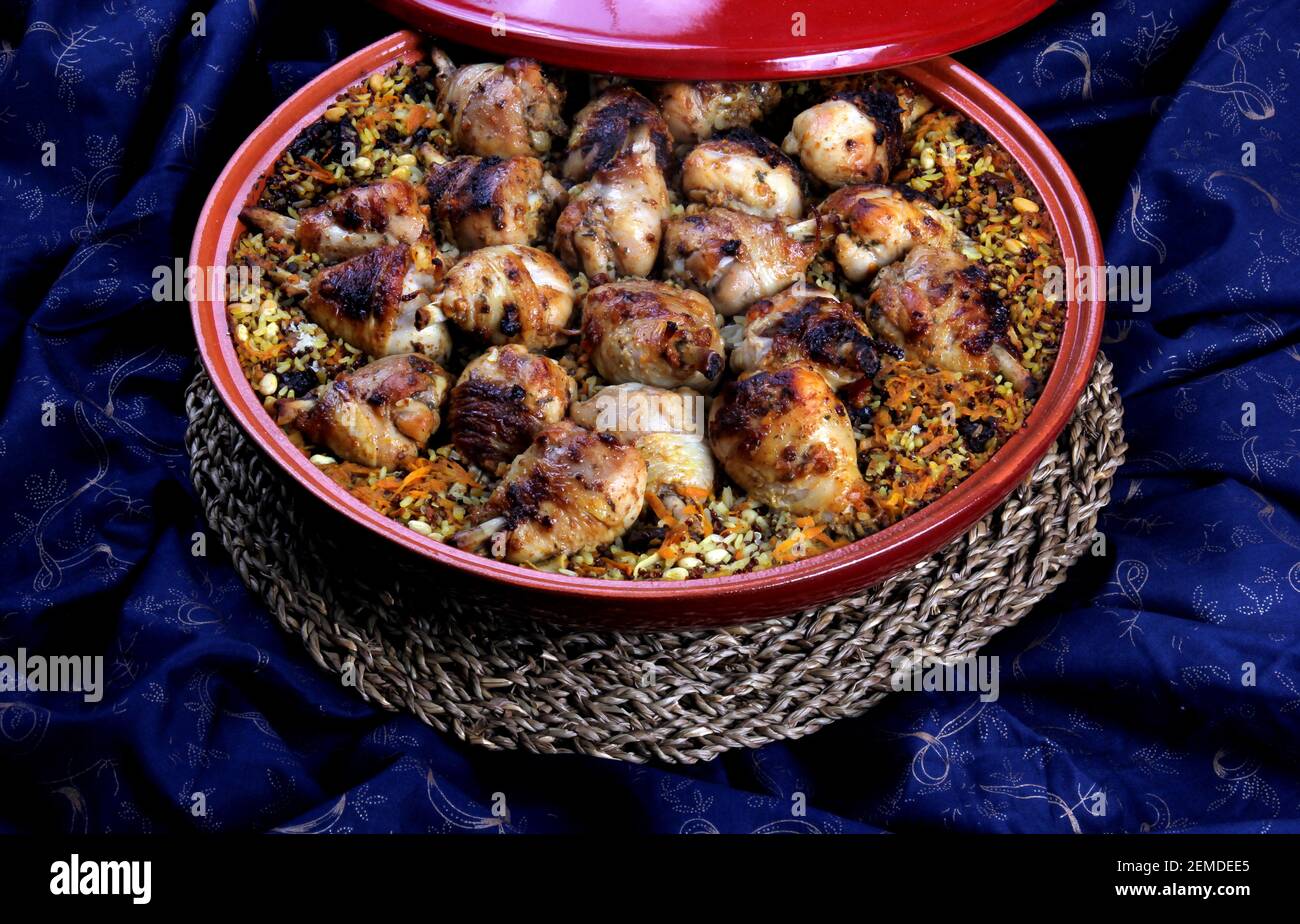 Traditional Tajine Berber Dish Made with Chicken Legs, couscous or rice ...