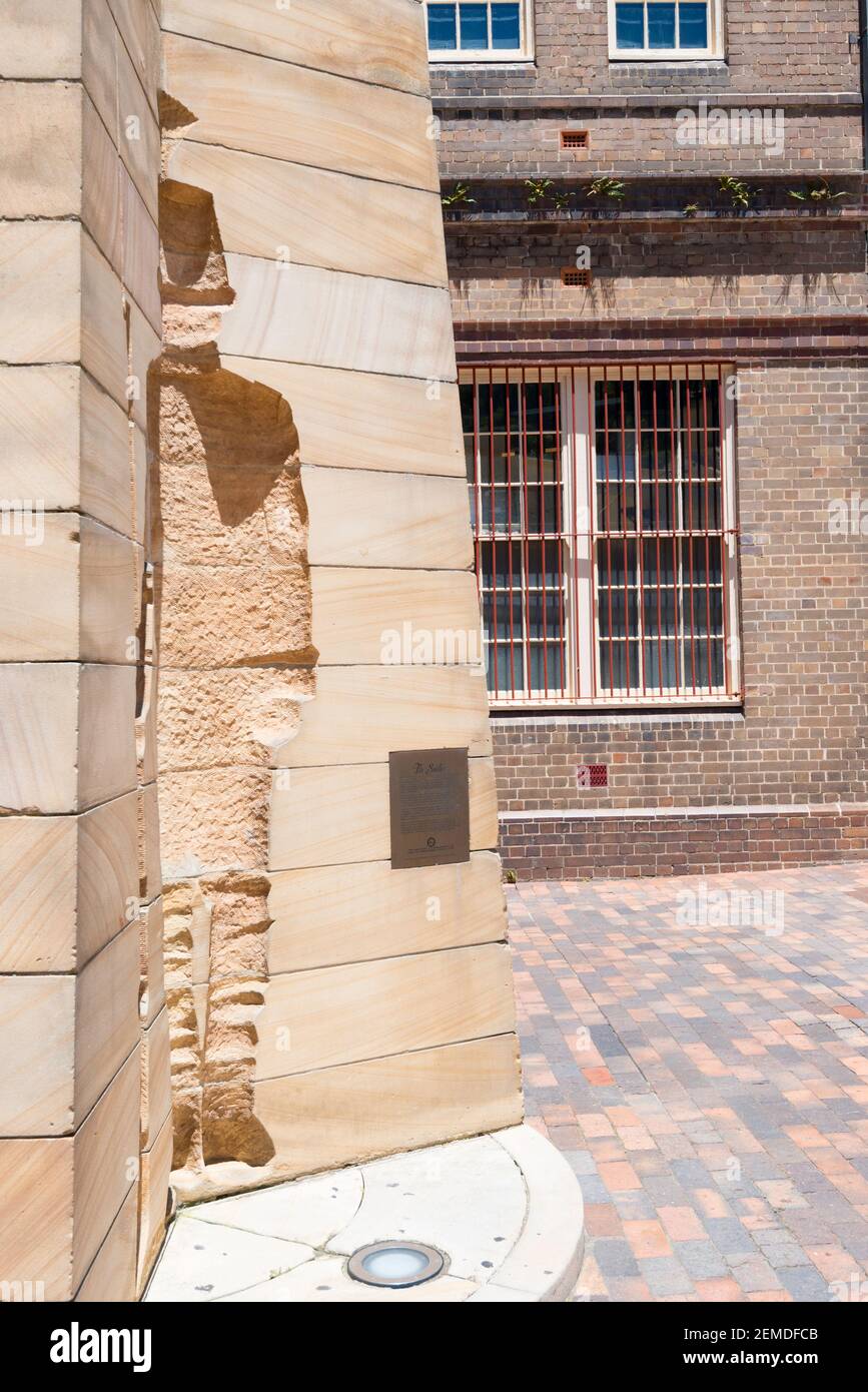 The 1979 sandstone relief sculpture First Impressions is a memorial to the convicts, soldiers and settlers of the early days of Sydney, Australia Stock Photo