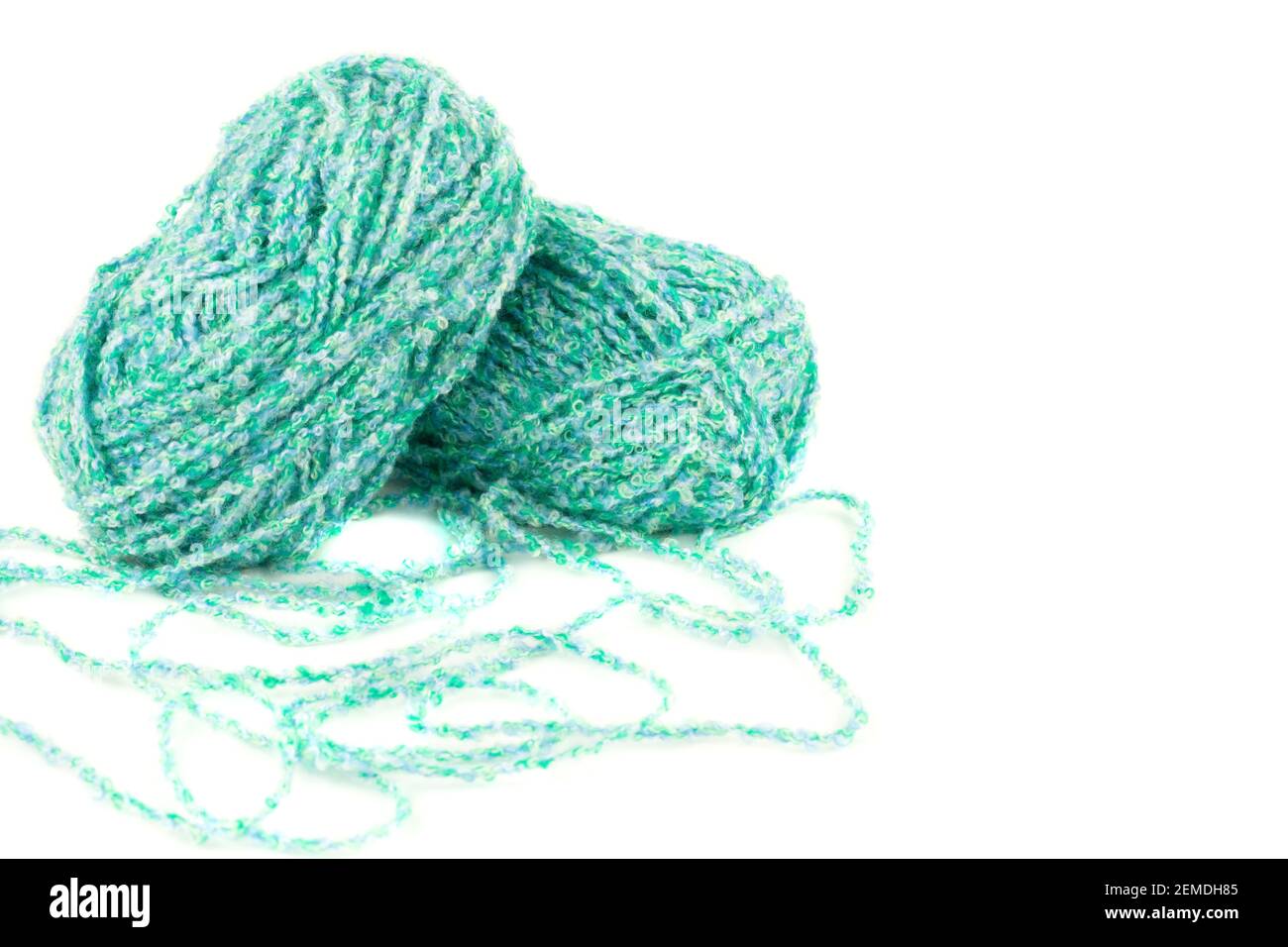 Two green knitting yarn clews isolated on white background. Stock Photo