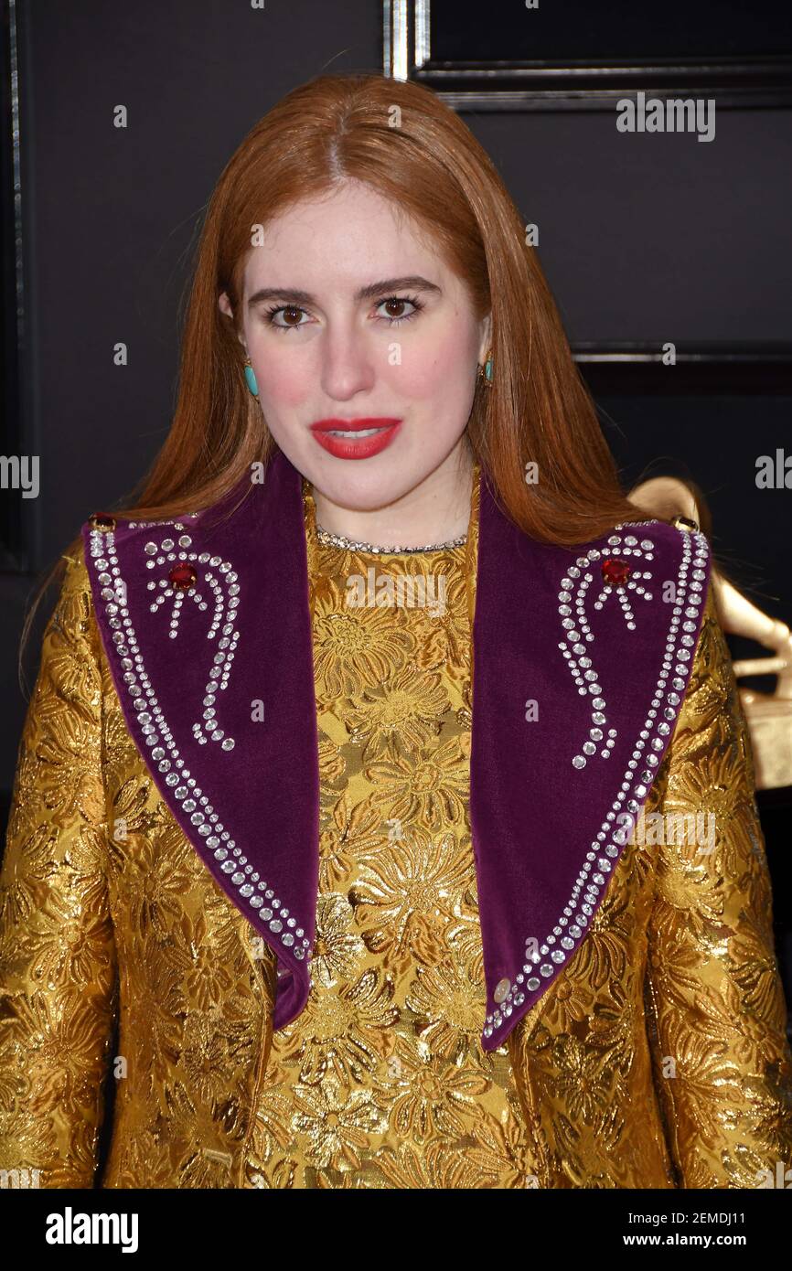 Victoria Kuhne arrives at the 61st Annual Grammy Awards red carpet at