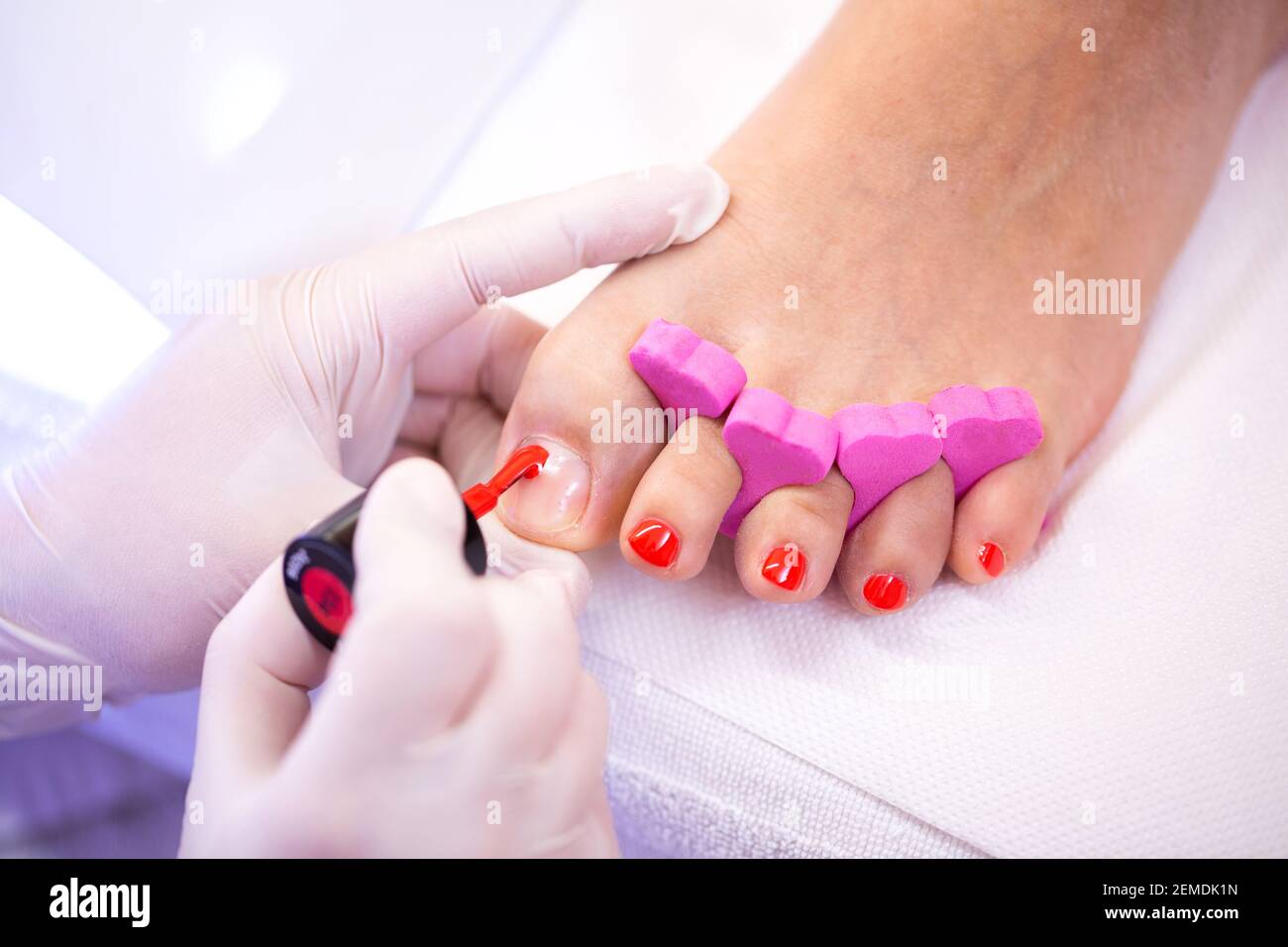 Feet young woman red toenails hi-res stock photography and images - Alamy