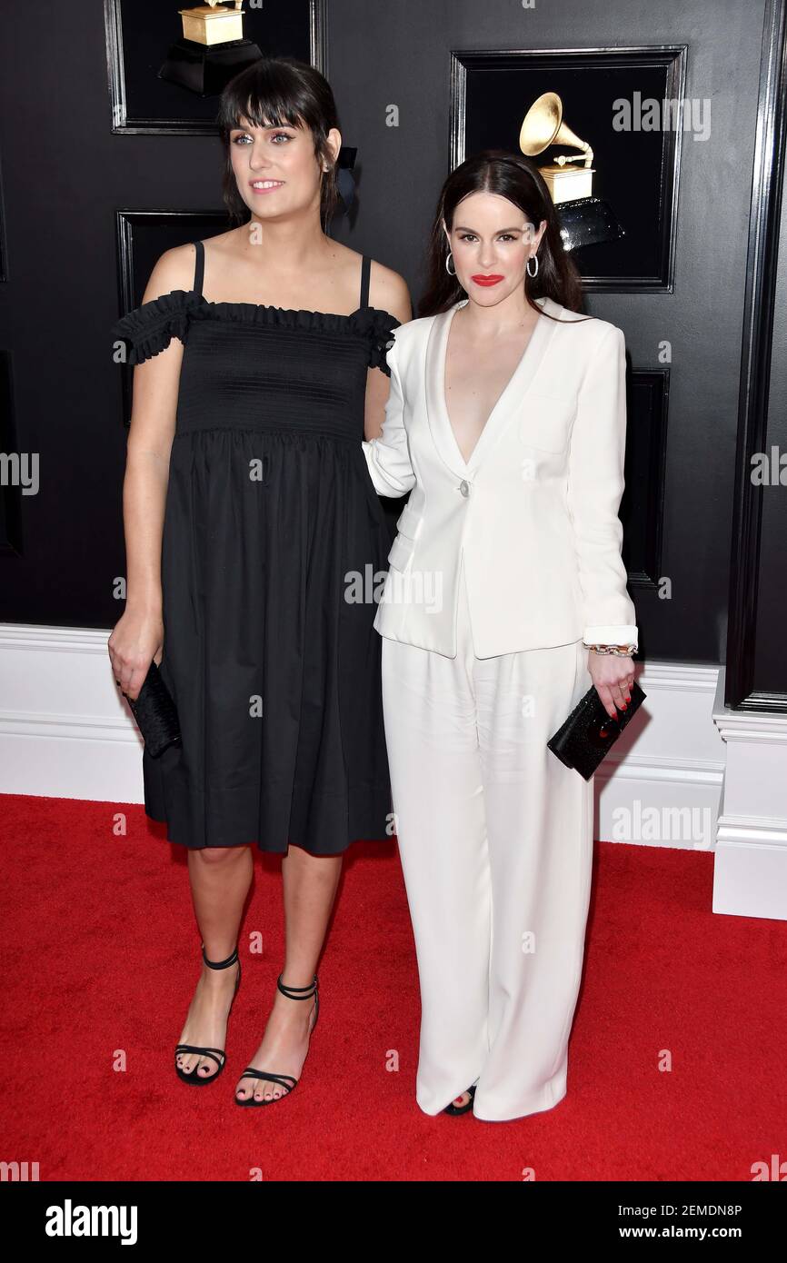 Teddy Geiger and Emily Hampshire arrives at the 61st Annual Grammy