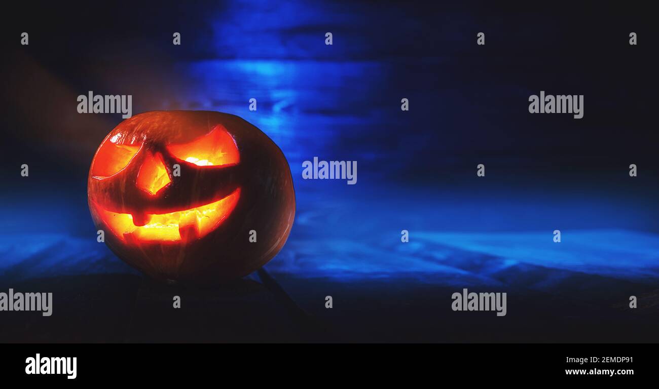 symbol of the holiday halloween pumpkin with carved eyes and mouth Stock Photo Alamy