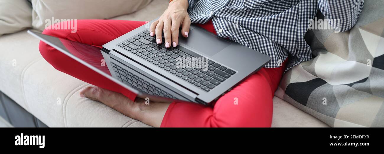 Woman feet on couch hi-res stock photography and images - Alamy