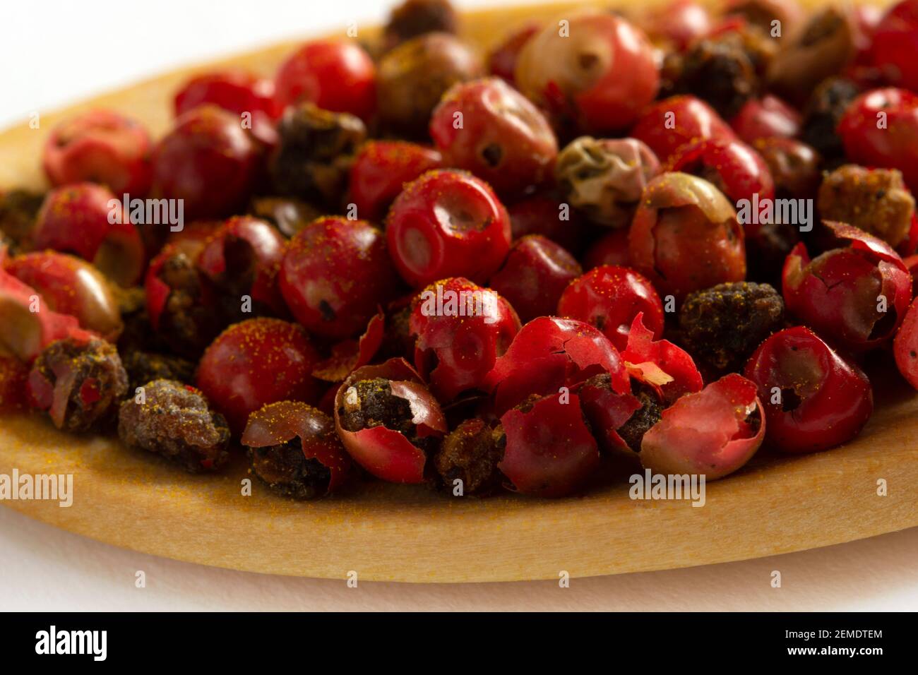 Red hot pepper and black pepper seeds Stock Photo Alamy