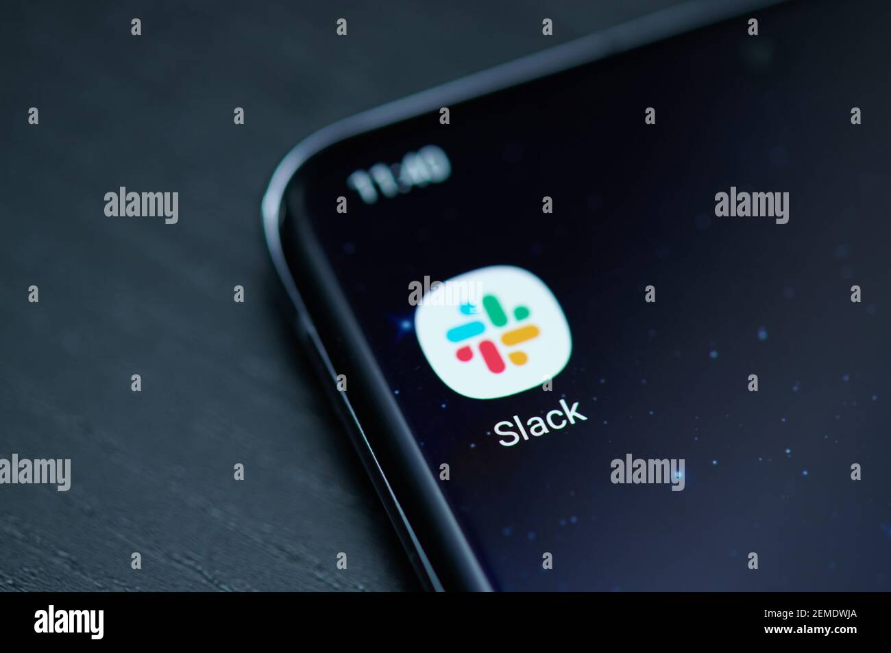 New york, USA - February 25, 2021: Slack messenger icon app on smartphone screen close up view Stock Photo