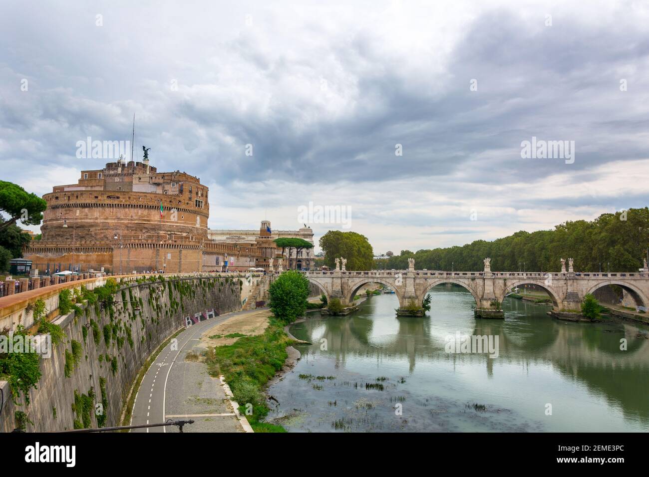 Rome, Italy - Oct 05, 2018: Tourists walking along the bridge of St. Angel, leading to the Castle of the Holy Angel in Rome Stock Photo