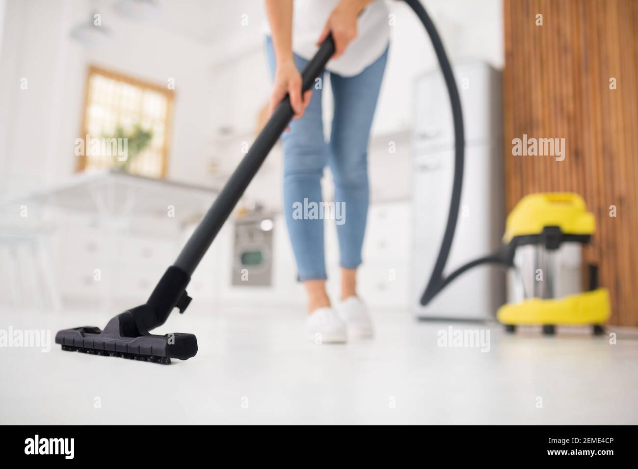 Vacuum cleaner brush over white floor surface Stock Photo Alamy