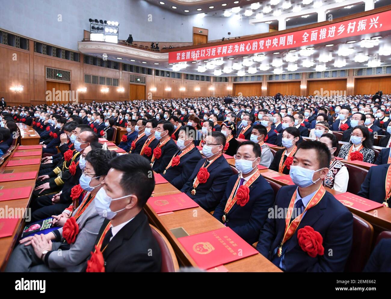 Beijing, China. 25th Feb, 2021. A grand gathering is held to mark the nation's poverty alleviation accomplishments and honor model poverty fighters at the Great Hall of the People in Beijing, capital of China, Feb. 25, 2021. Credit: Xie Huanchi/Xinhua/Alamy Live News Stock Photo