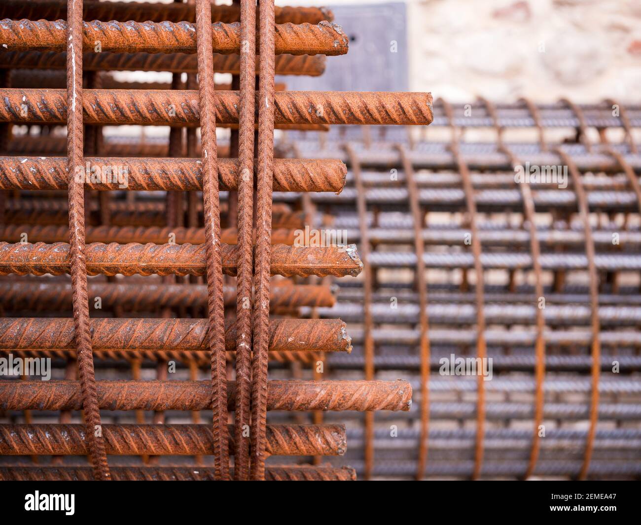 Iron on construction site. Rusty Iron Bundle for making reinforcement concrete . rebar for reinforce hole in the ground. Texture background net metal Stock Photo