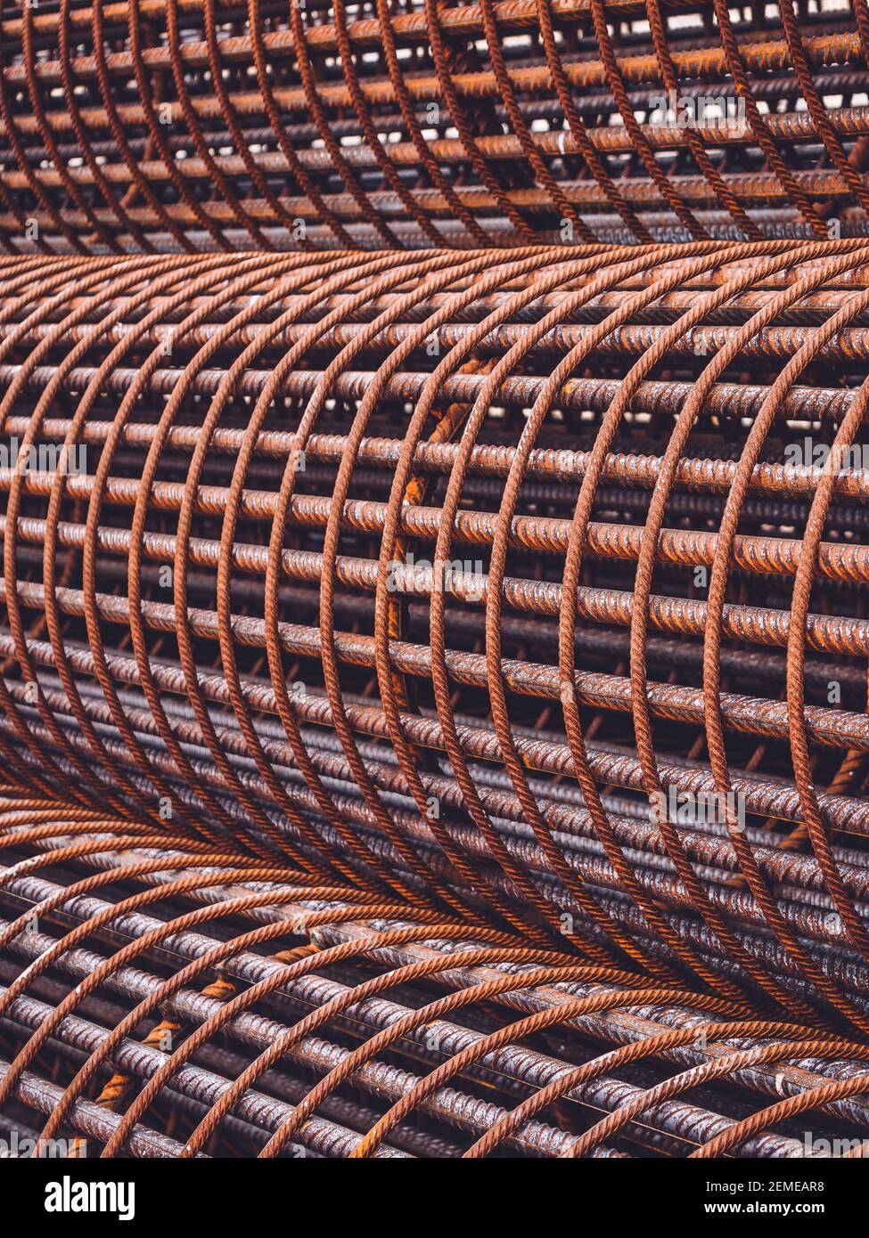 Iron on construction site. Rusty Iron Bundle for making reinforcement concrete . rebar for reinforce hole in the ground. Texture background net metal Stock Photo