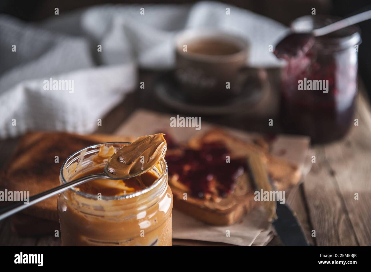 Peanut butter with jam and rustic dough. Peanut butter and jelly Stock