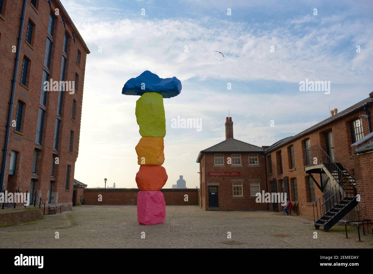 Liverpool, United Kingdom, 2nd February, 2020: Natural perspective of the colorful Liverpool mountain sculpture outside the Tate gallery in Liverpool Stock Photo